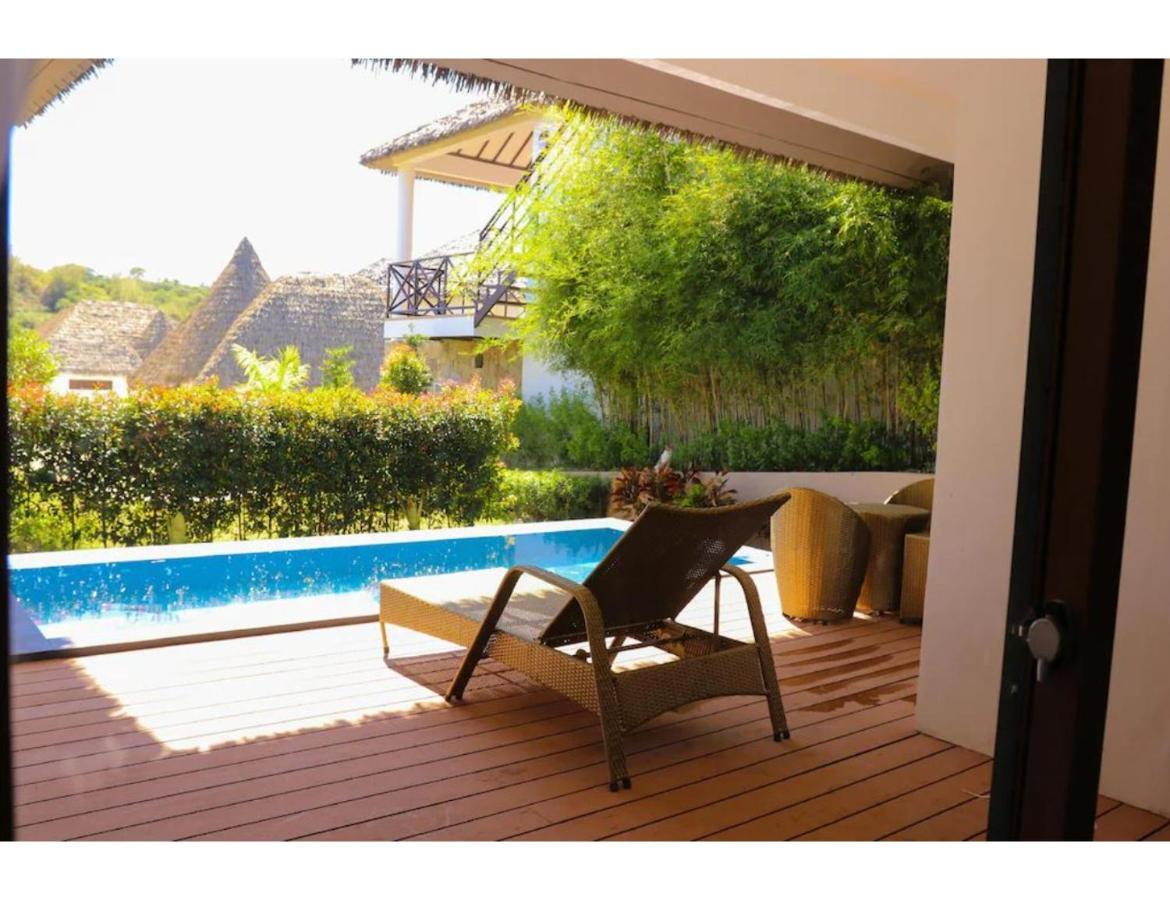 Safari Hotel And Villas Powered By Cocotel Bulala Exterior photo